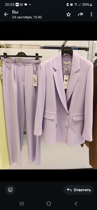 Продам новый костюм