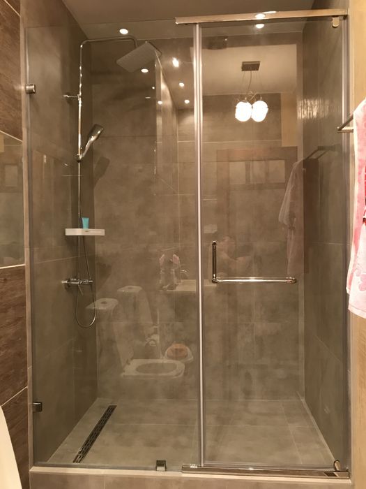 Душевые кабины и ванные перегородки