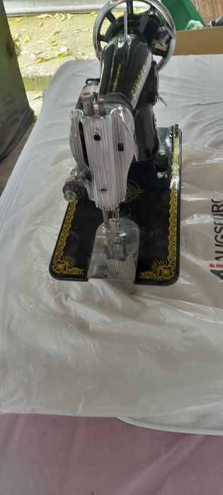 masina de cusut Singer