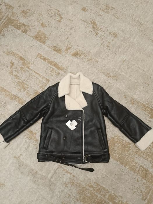 Женская дубленка короткая