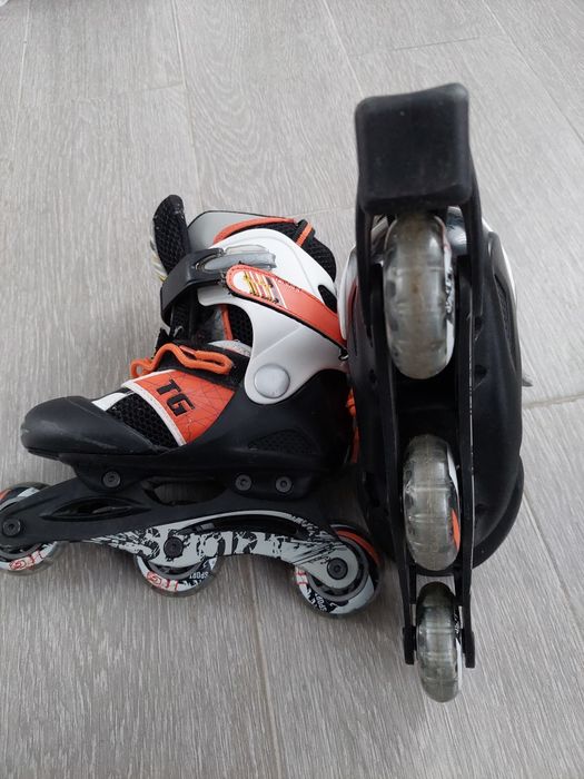 Роликовые коньки