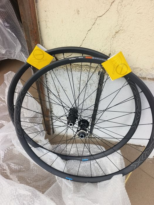 Капли Гравел Shimano GRX WH-RX570-TL Wheelset-12x100mm | 12x142mm - HG