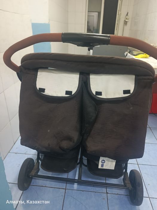 Двухместный коляски