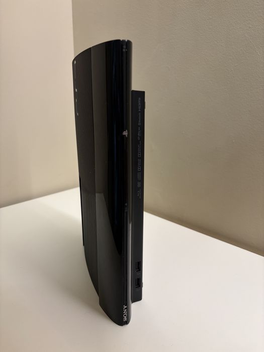 PS3 SuperSlim modat 10 jocuri
