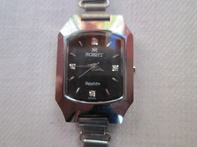 ROSHT швейцарски дамски часовник с 4 диаманта на циферблата.