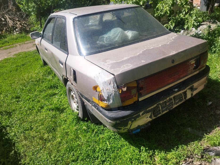 Мазад 323  на ходу