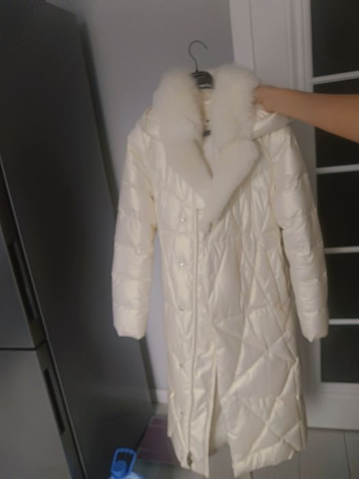 Продам зимний пуховик