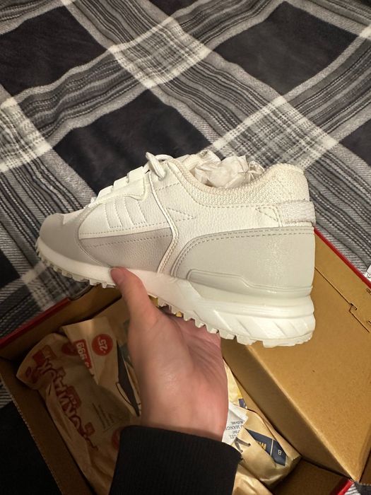 Белые кроссовки Xtep