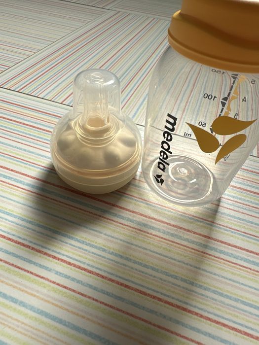 Pompă Medela Mini - electrică + biberon Medela Calma