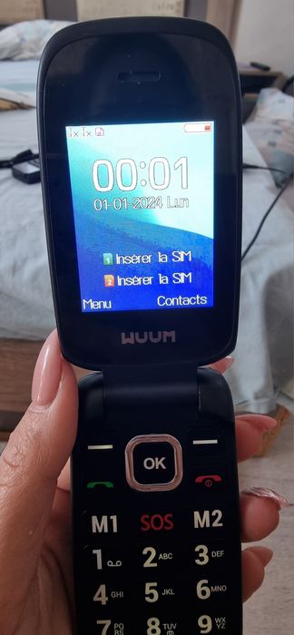 Телефон с копчета  Wuun