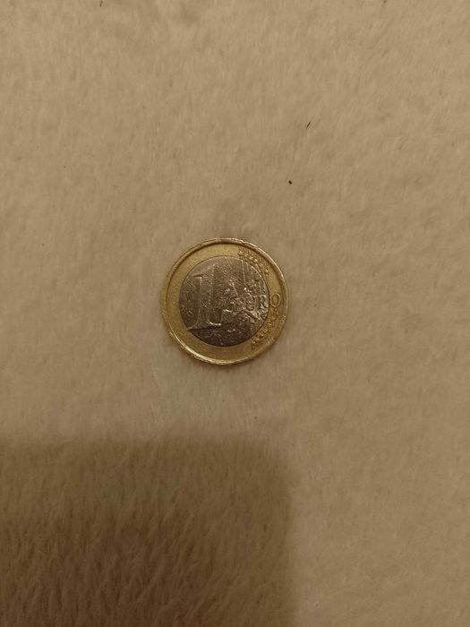 Moneda euro rara, de colecție, " Omul Vitruvian", 2002, preț 3000 lei.