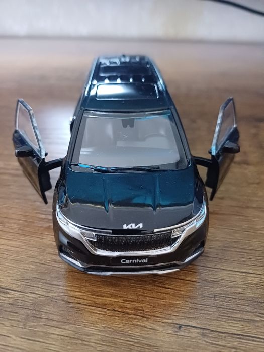 Игрушка модель kia carnival