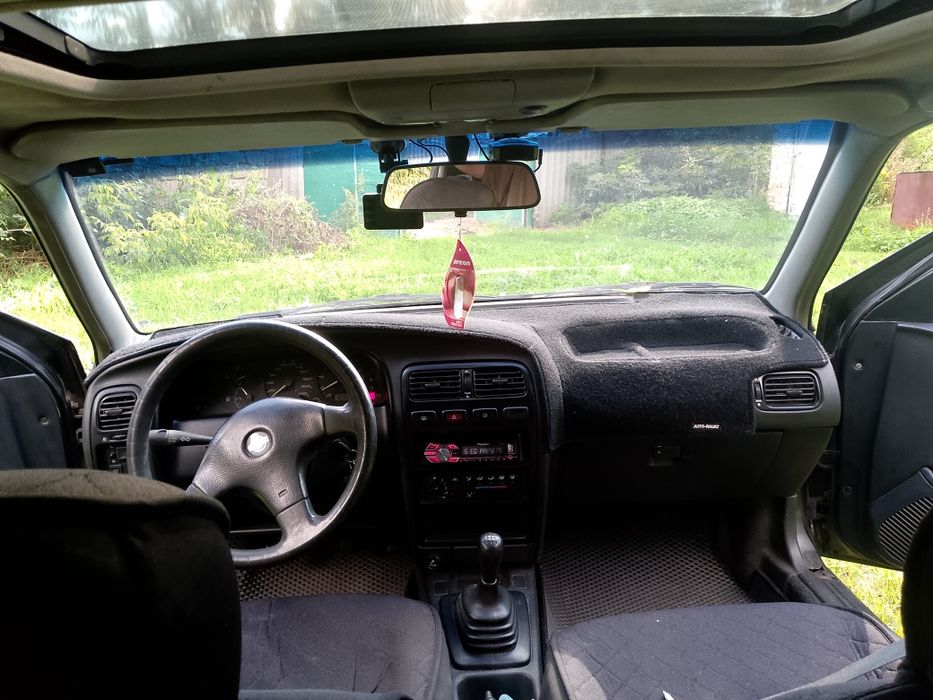 Нисан примера бензин