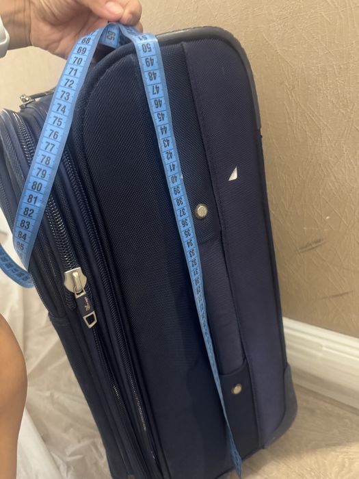 Чемодан синий 4 колеса