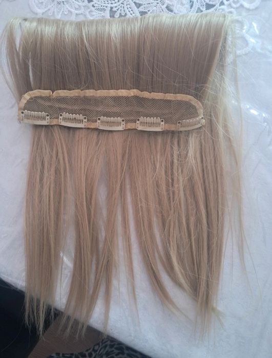 Tresa par Nicole  D Mar imita bine parul natural