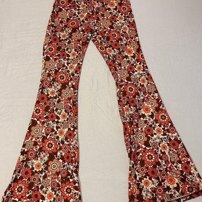 Pantaloni cu talie înaltă și imprimeu floral, model evazat