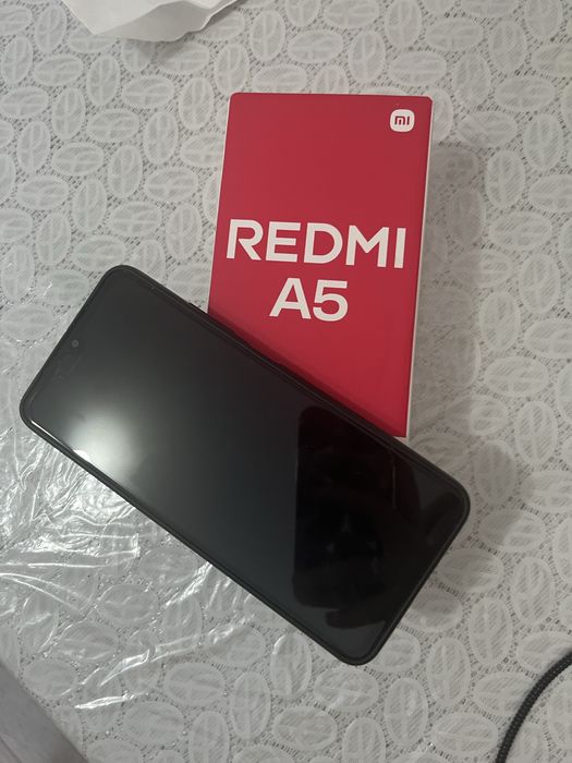 Продам новый телефон Redmi A5