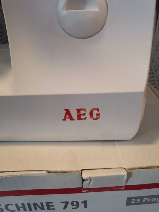 Шевна машина AEG 791 и оверлог Singer