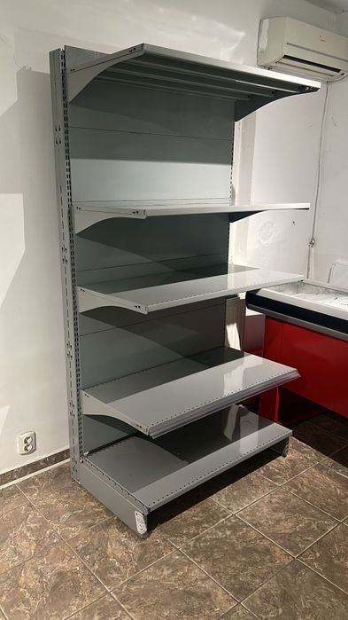 Stoc 5km rafturi de magazin second hand