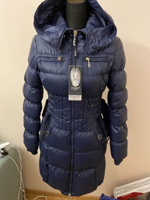 Продам пуховики (куртки )