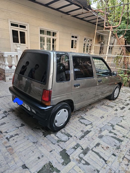 2000 йил тико тозз