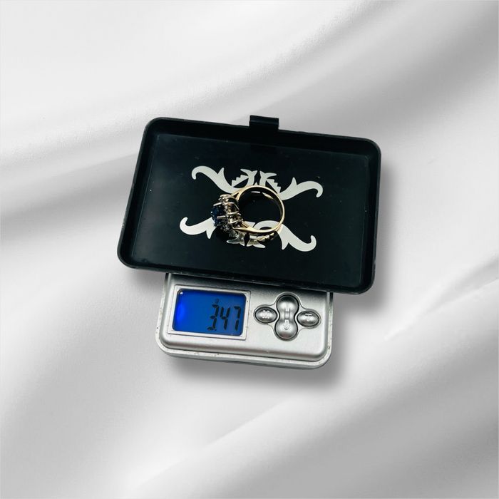 Златен пръстен с диаманти и сапфир 14к