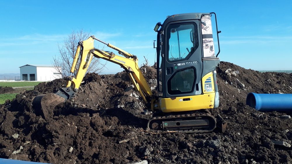 Багер,бобкат и самосвал