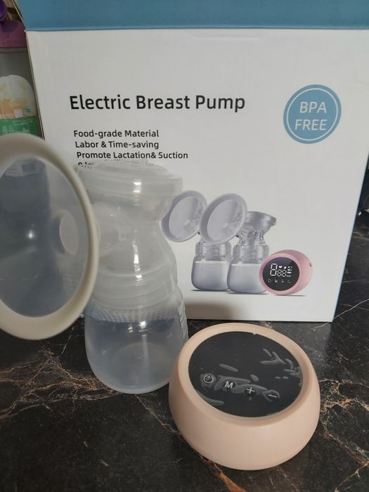 Продам электрический молокоотсос