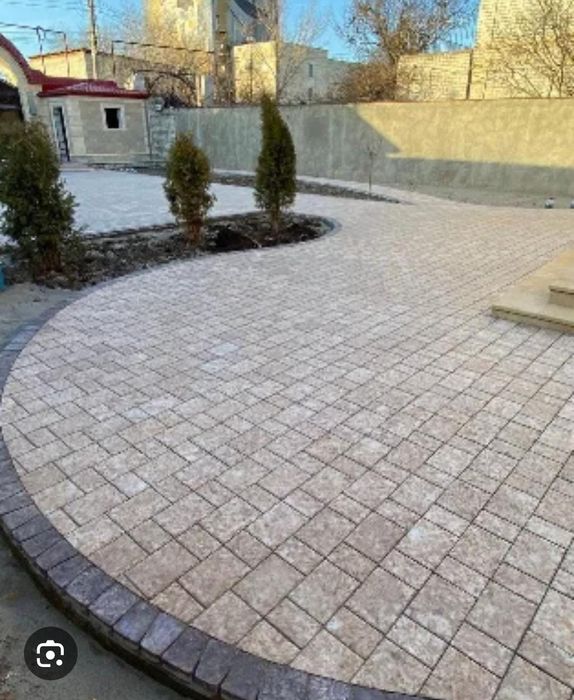 Укладка брусчатки, тротуарной плитки.