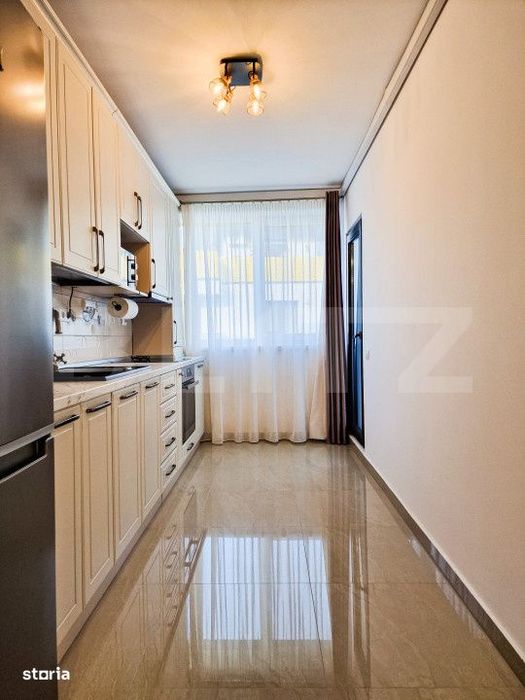 Apartament modern cu 2 camere, garaj, 49mp, etajul 2, zona Vivo