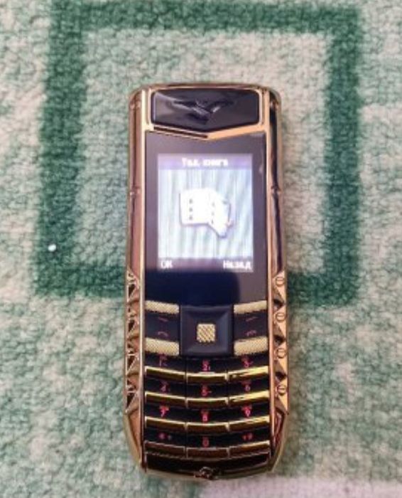 Мобилен телефон марка SERVO с две СИМ карти + кутия + зарядно + калъв