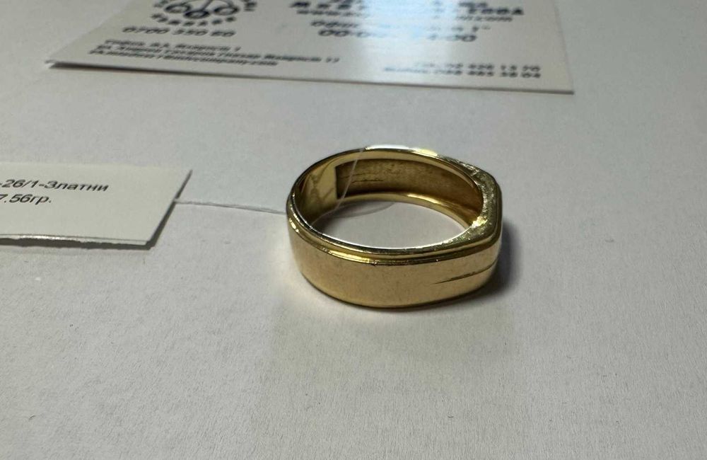 Златен пръстен 7.56гр.18К с диамант+сертификат