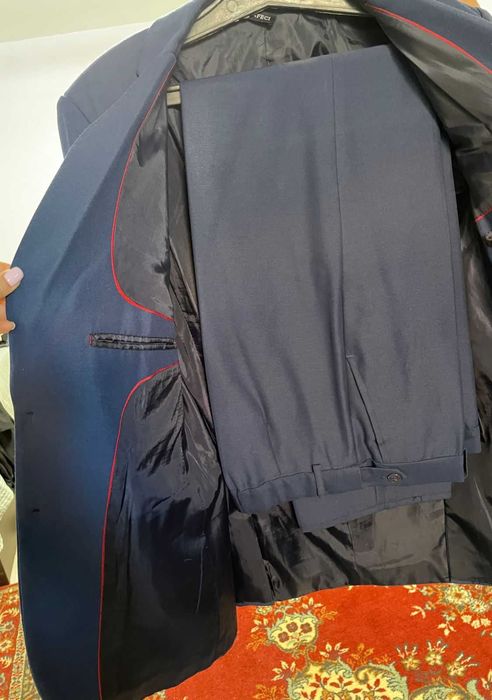 Костюмы   синего цвета