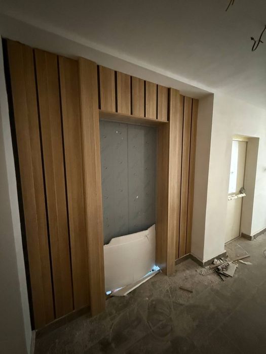 Obshivka devorga liftga o‘rnatamiz. Mdf va yog‘och ishlarini bajaramiz