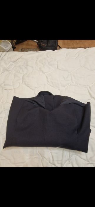 Пиджак двубортный совершенно новый.