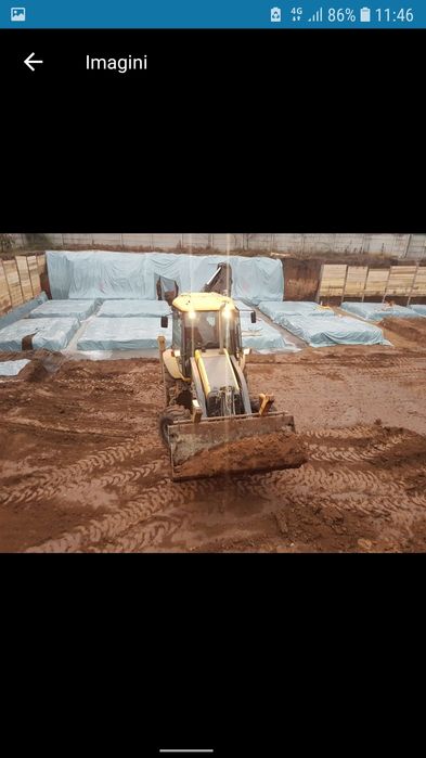 Inchiriere Buldoexcavator caterpillar cu picon si autobasculante 8x4