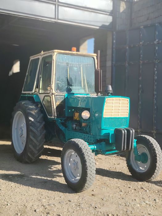 Трактор ЮМЗ с пресс подборшиком