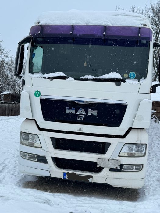 Vând ansamblu MAN TGX 440 + Semiremorca Schmitz