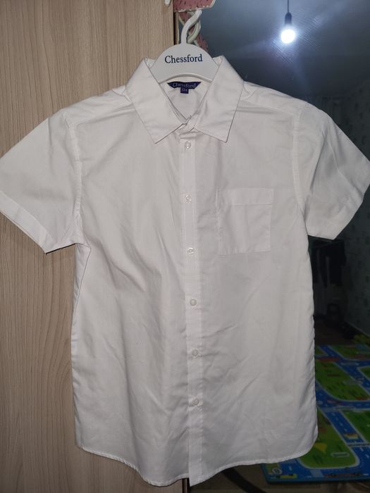 Школьные рубашки новые.