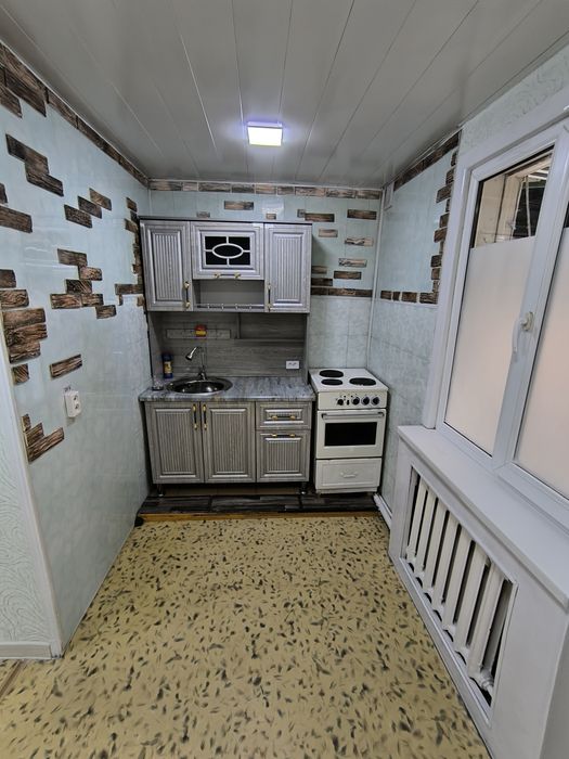 2 комнатную квартиру. 1/2 в деревянном доме.' выход в город въезд авто