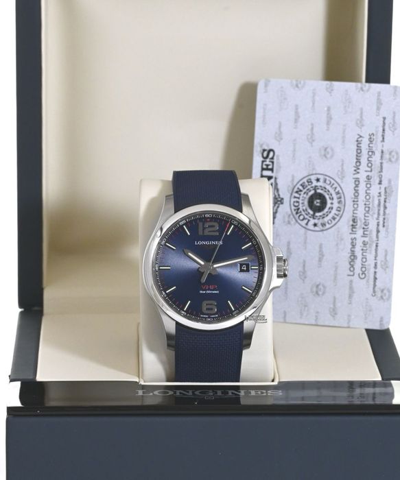 Швейцарские часы фирмы Longines Conquest V.H.P.