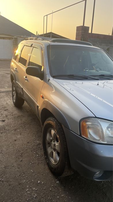 Мазда трибьют 3 литра