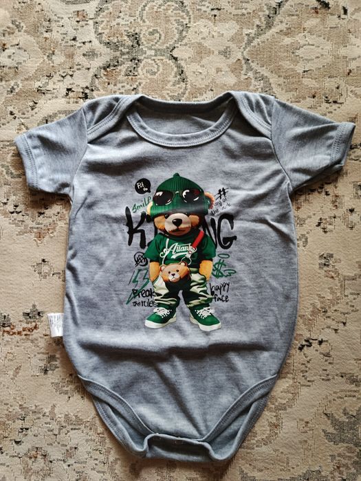 Продам боди новые от 6 месяцев до года