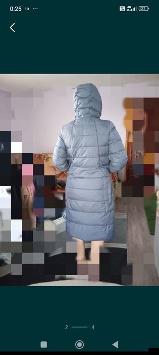 Продам пуховик Xaski