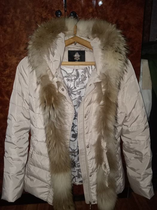 Продам зимний пуховик