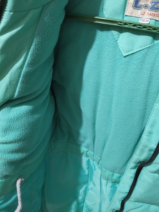 Продам пуховик зимний для девочки