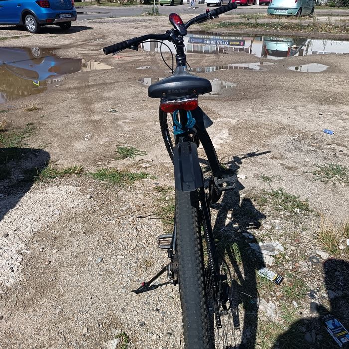 Bicicleta aproape noua