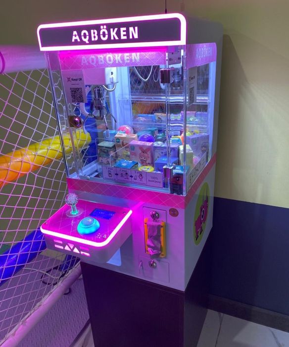 Игровой аппарат с игрушками