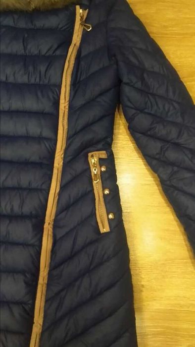 Продам пуховик зимний