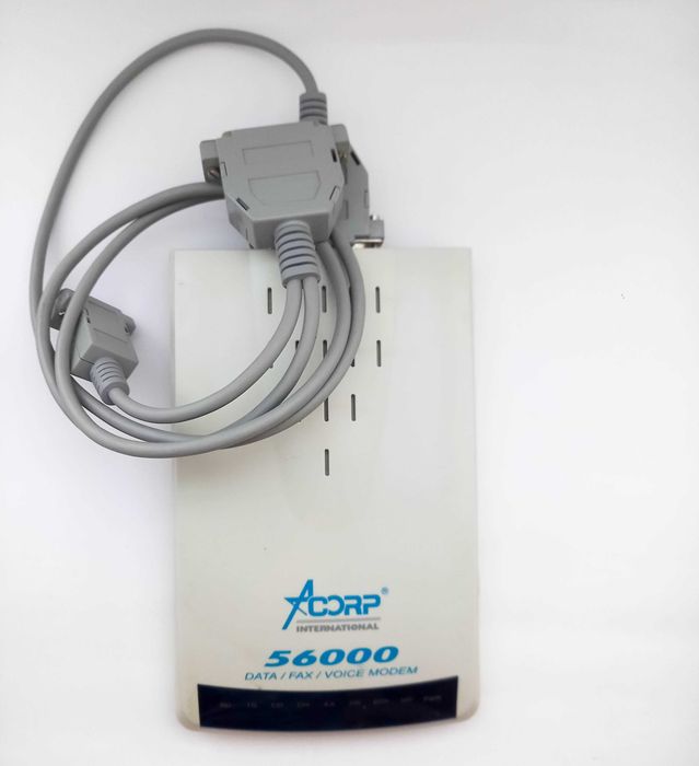 Модем Acorp 56000 Bps Acorp External Voice / Fax / Modem Модеми Акорп Akopt